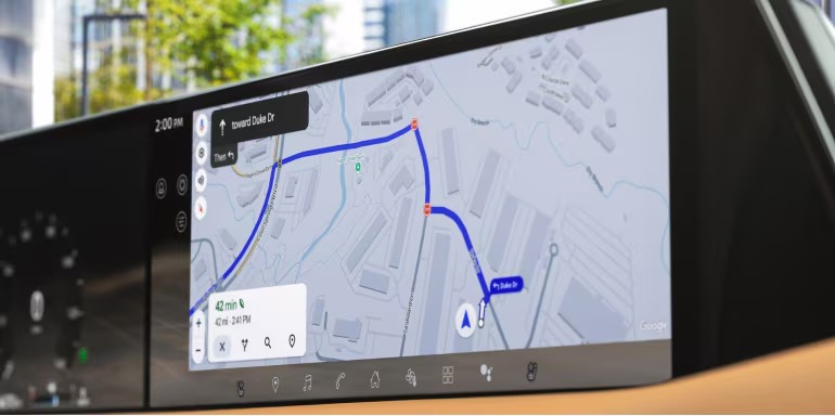 Driver inside the all-new 2025 Nissan Armada with navigation display and premium interior.